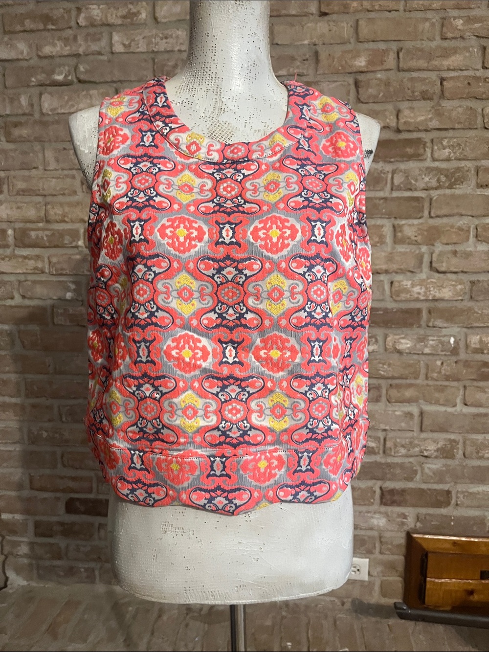 the clothing company Coral, Navy & Yellow Patterned Jacquard Sleeveless Top.